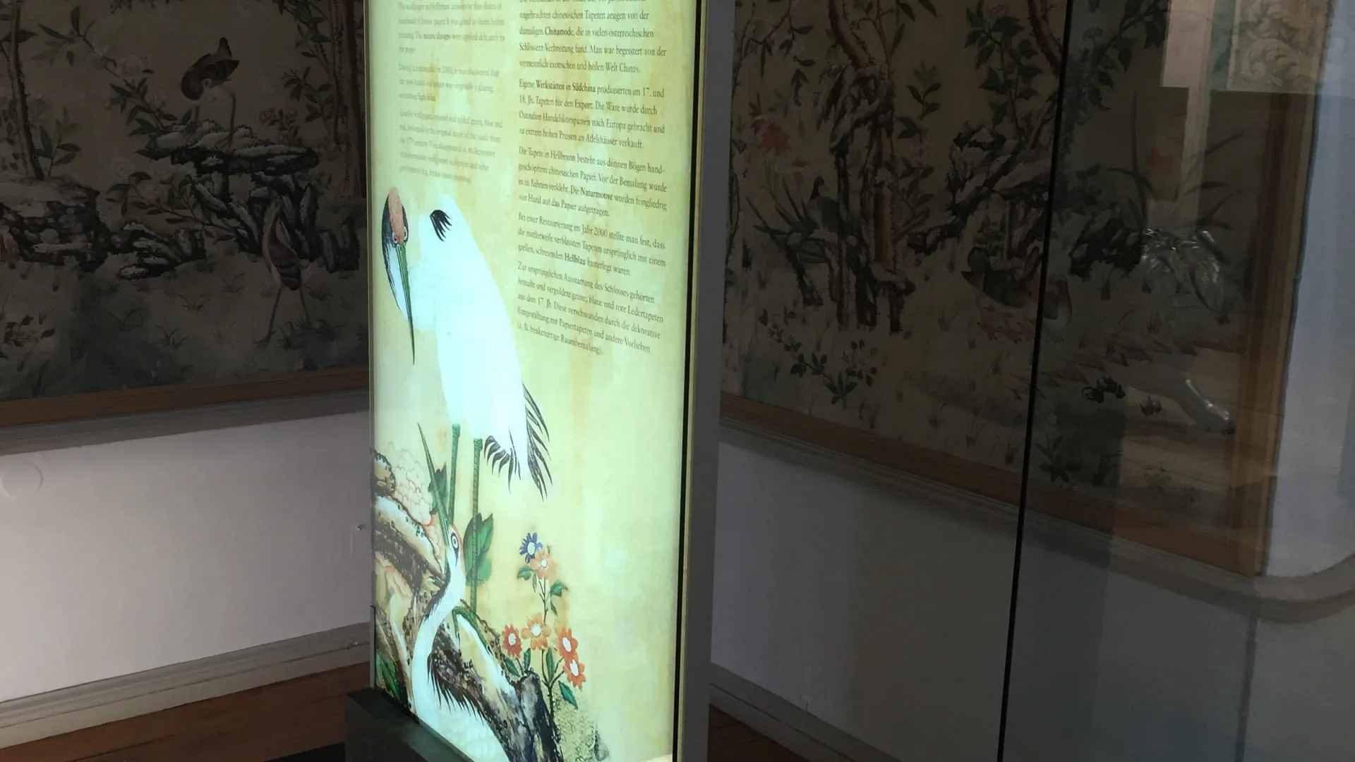 Informationsschild über chinesische Tapeten in einem Museum